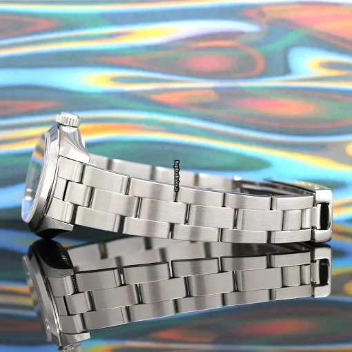 Terrific Fake Rolex Oyster Perpetual 67180 Caliber 2130 Automatic Movement 26x42mm Steel Case Womens Watch - Image 10
