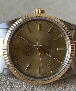 Wholesale Imitation Rolex Oyster Perpetual 14233 Caliber 3000 Automatic Movement 34mm Gold/steel Case Mens/unisex Watch